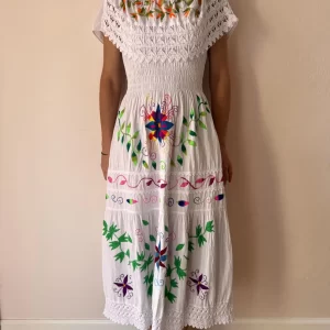 Shipibo Icaros Chacruna Kené ceremonial dress made of white cotton, hand-embroidered.